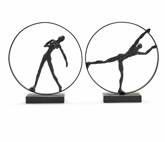 Movement Sculptures on Black Stand