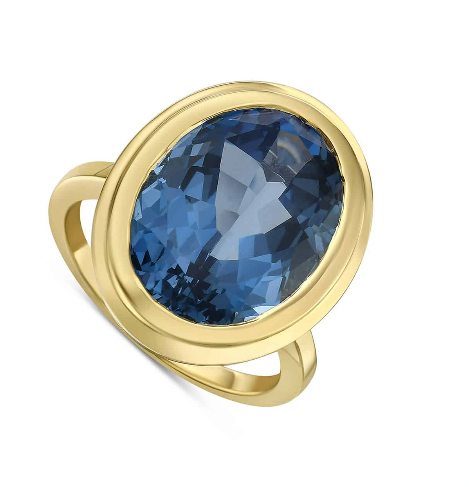 14KY Oval Blue Topaz Ring