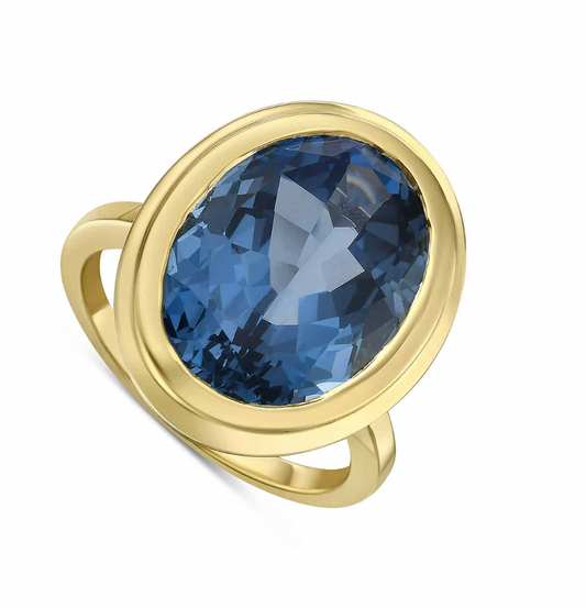 14KY Oval Blue Topaz Ring
